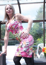 Naughty British housewife playing in the gardenhouse