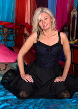 Elite Mature Porn Pics Platinum blonde granny Ellen B. is dressed to impress in an evening gown that lifts to show off her thigh high stockings and carters. Beneath her dress is a corset that pushes up her swinging all naturals. Check her out as she spreads her thighs and pussy - Anilos xxx sex photos