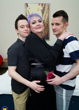 Curvy mama is taking two young cocks at once from her toyboys