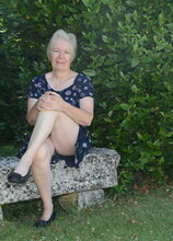 Horny British mature lady playing in the garden