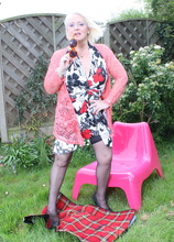 Naughty British housewife getting dirty in the garden
