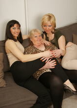 Three old and young lesbians make out on the couch