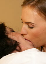 Three old and young lesbians have fun on bed