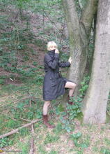 Blonde mature slut playing naked in the forest