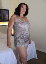 take a look at this horny mature housewife