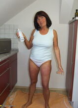 kinky mama playing with some whipped cream