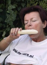 Mature slut playing with herself in the garden