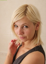 Blond wife Emilia masturbating in the shower. in Karupsow | Elite Mature